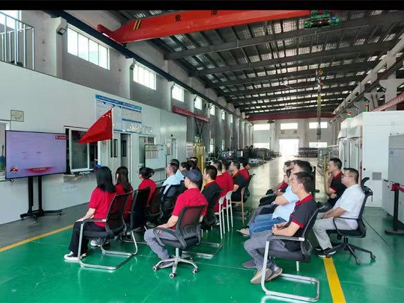 Shanghai Guanding's Whole Staff Watch the 2025 Military Parade in the Workshop: Witnessing the Power of a Great Nation and Igniting the Passion for Industrial Service to the Country